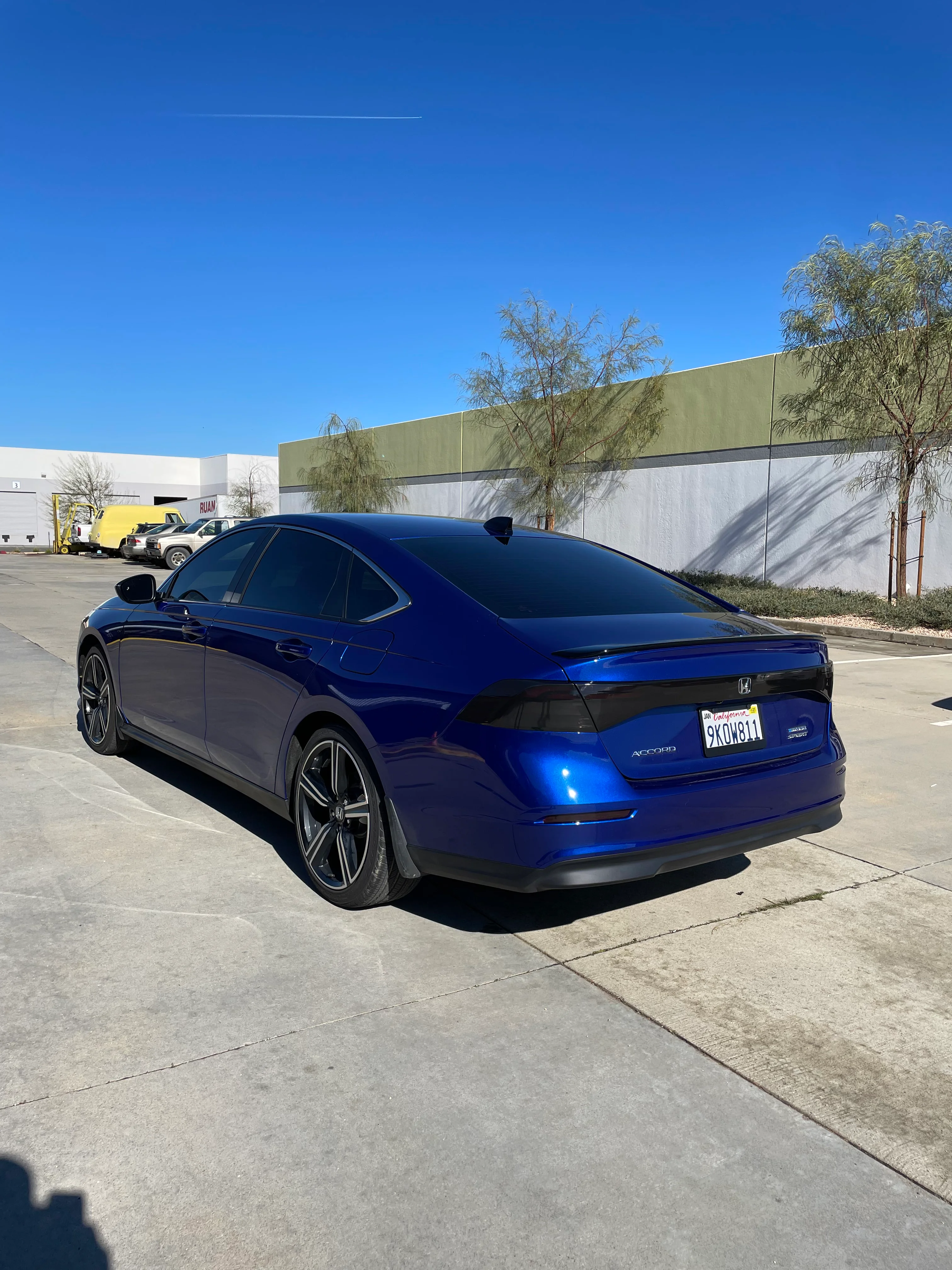 Blue Honda Accord with professional window tinting on rear and side windows