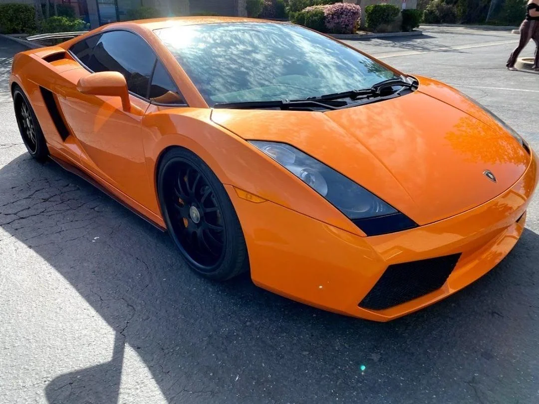 Orange Lamborghini Gallardo with professional window tinting installed